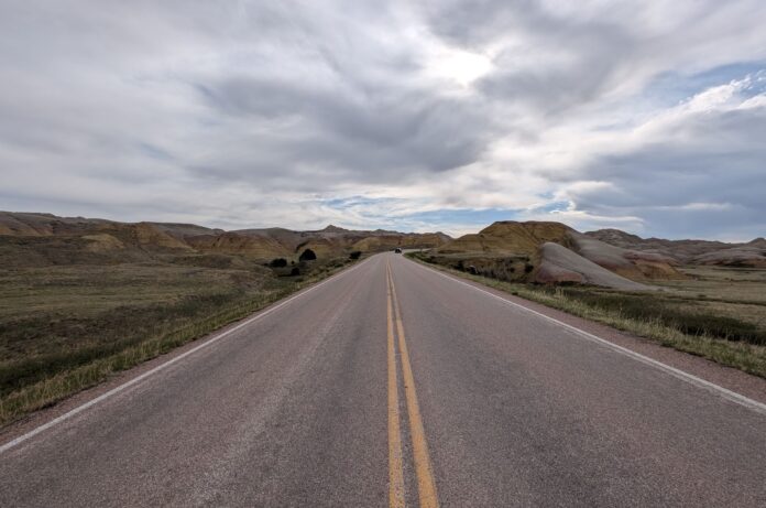 badlands south dakota road with car